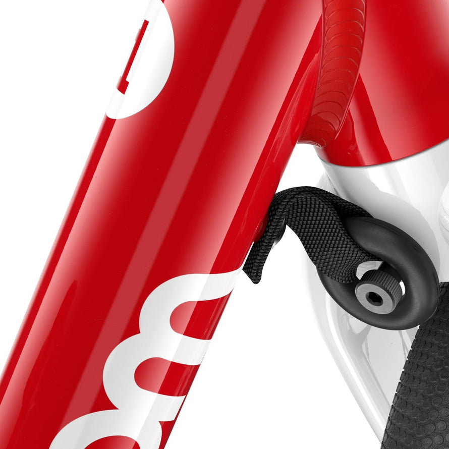 Draisienne rouge Woom GO 1 pour enfants 18 mois a 3.5 ans avec detail du cadre et fixation