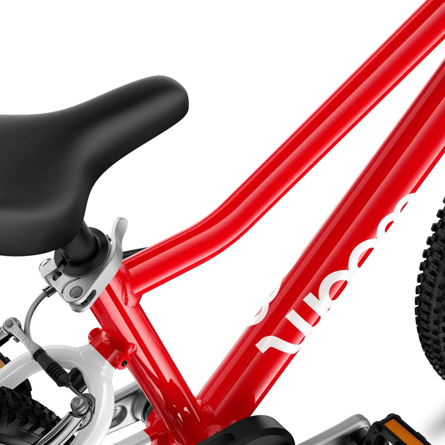 Cadre rouge ergonomique du velo enfant 16 pouces Woom GO 3 Automagic, leger et adapte aux enfants 4 a 6 ans