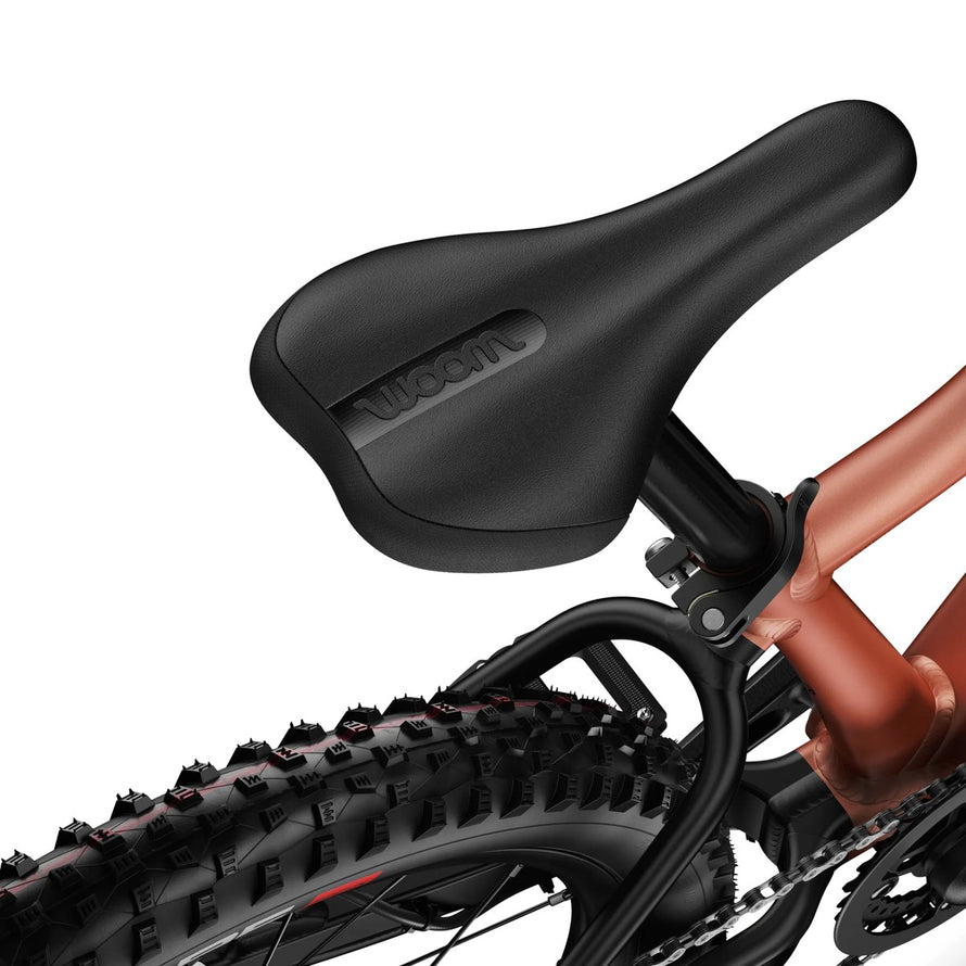 Selle ergonomique et pneu tout-terrain du velo enfant 20 pouces woom OFF 4 pour enfants 6 a 8 ans
