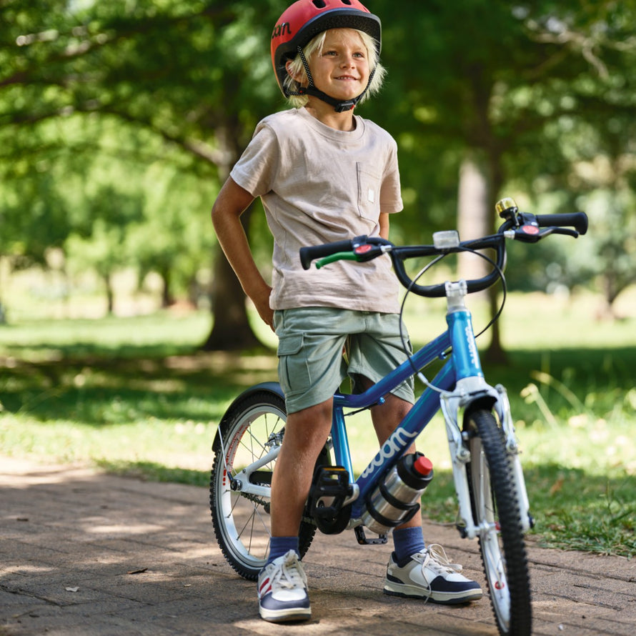 Velo enfant Woom 4-6 ans modele GO 3 bleu avec cadre leger et design ergonomique pour debuter le velo