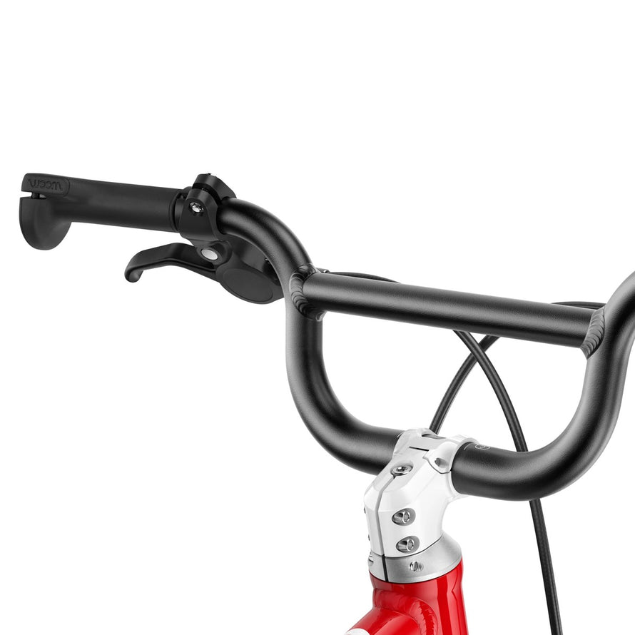 Guidon noir ergonomique du vélo enfant Woom 4-6 ans modèle GO 3 pour un contrôle facile et sécurisé