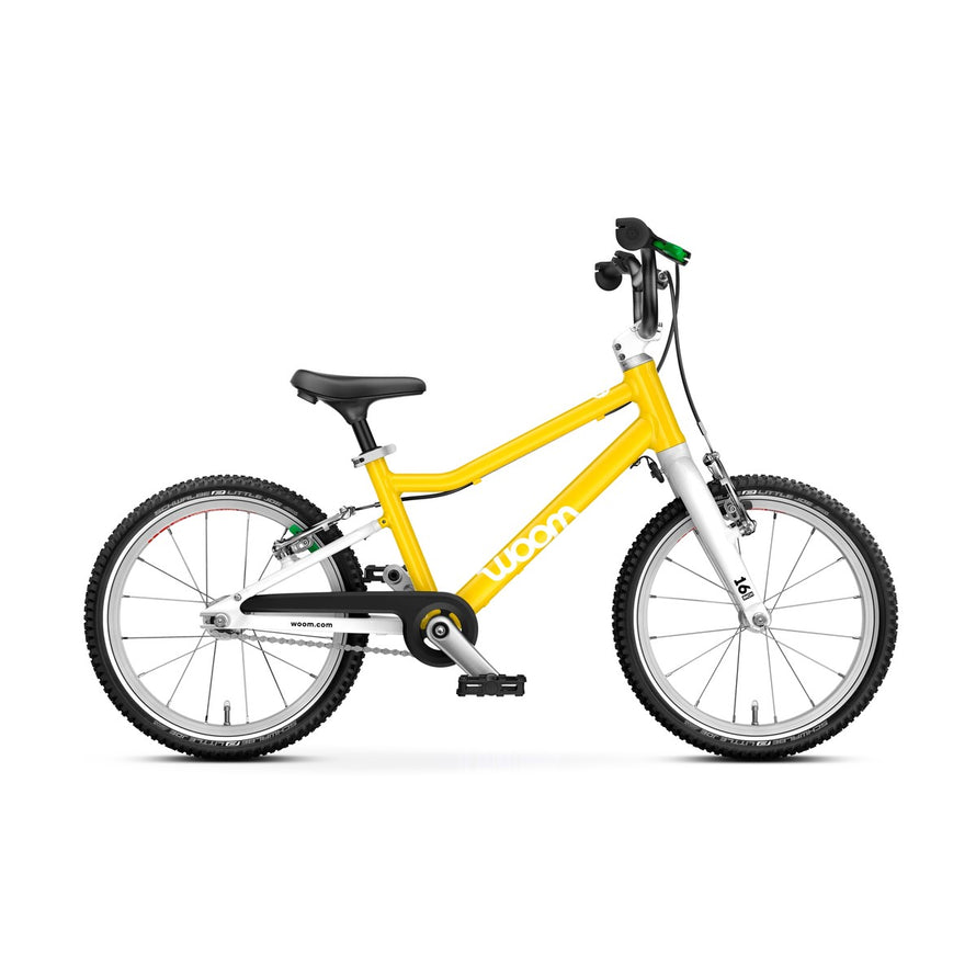 Vélo enfant Woom 4-6 ans modèle GO 3 jaune avec cadre léger et freins adaptés pour apprentissage sécurisé